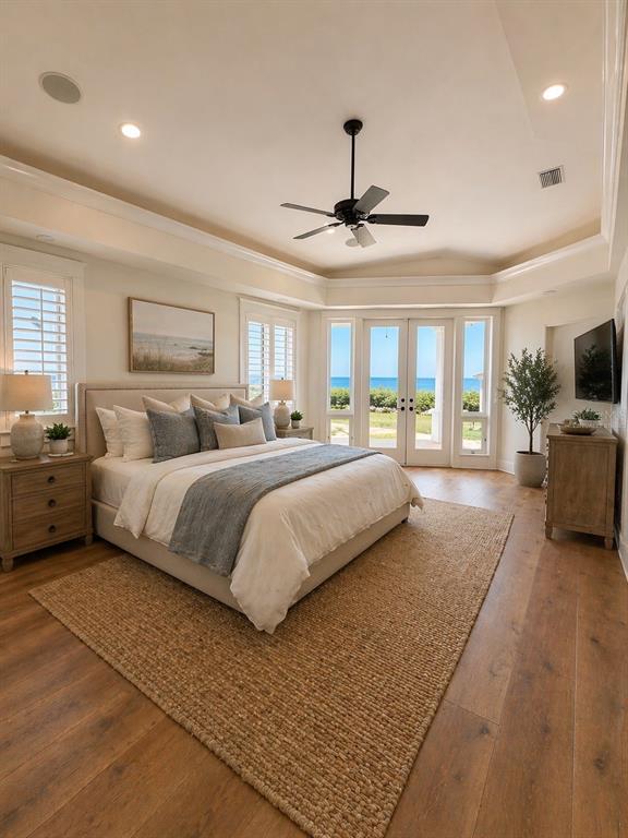 1721 Gulf Road Tarpon Springs, FL 34689 - Photo 26 of 96 a bedroom with a large bed and flat tv