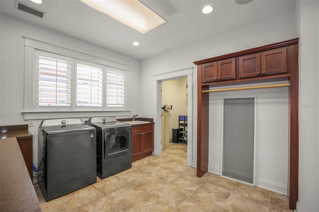 1721 Gulf Road Tarpon Springs, FL 34689 - Photo 34 of 96 a kitchen with stainless steel appliances granite countertop a stove and a refrigerator