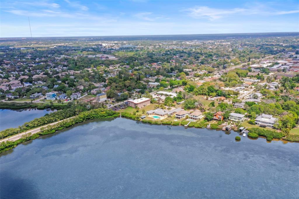 1721 Gulf Road Tarpon Springs, FL 34689 - Photo 68 of 96 an aerial view of a houses with a yard and ocean view