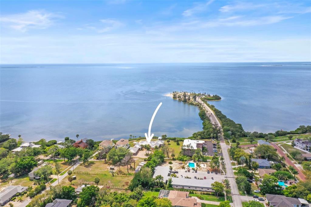 1721 Gulf Road Tarpon Springs, FL 34689 - Photo 80 of 96 an aerial view of a house with a yard