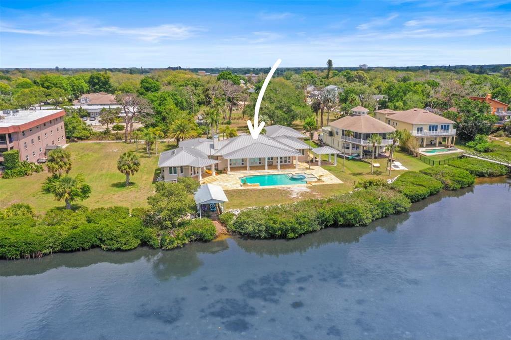 1721 Gulf Road Tarpon Springs, FL 34689 - Photo 81 of 96 an aerial view of residential houses with outdoor space and street view