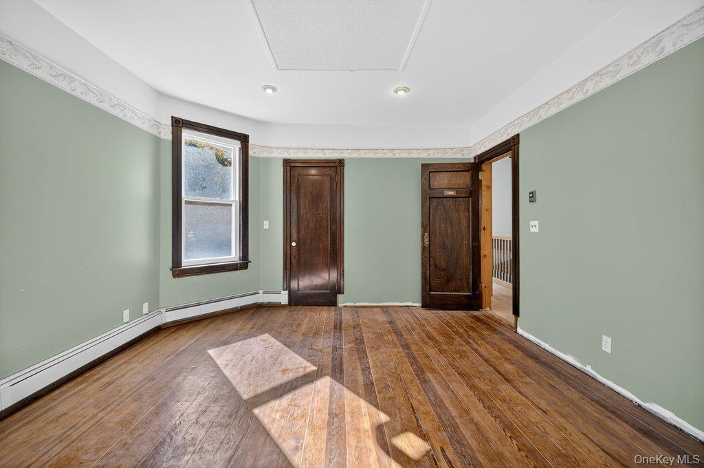 37 Little Road Wurtsboro, NY 12790 - Photo 16 of 24 an empty room with windows