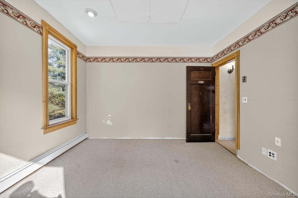 37 Little Road Wurtsboro, NY 12790 - Photo 19 of 24 a view of an empty room with a window