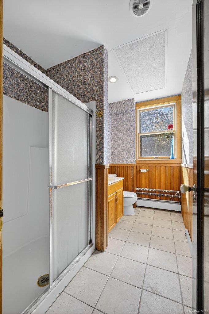 37 Little Road Wurtsboro, NY 12790 - Photo 20 of 24 a view of a refrigerator in kitchen and an empty room