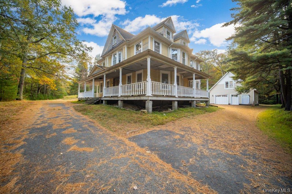 37 Little Road Wurtsboro, NY 12790 - Photo 2 of 24 a front view of a house with a yard