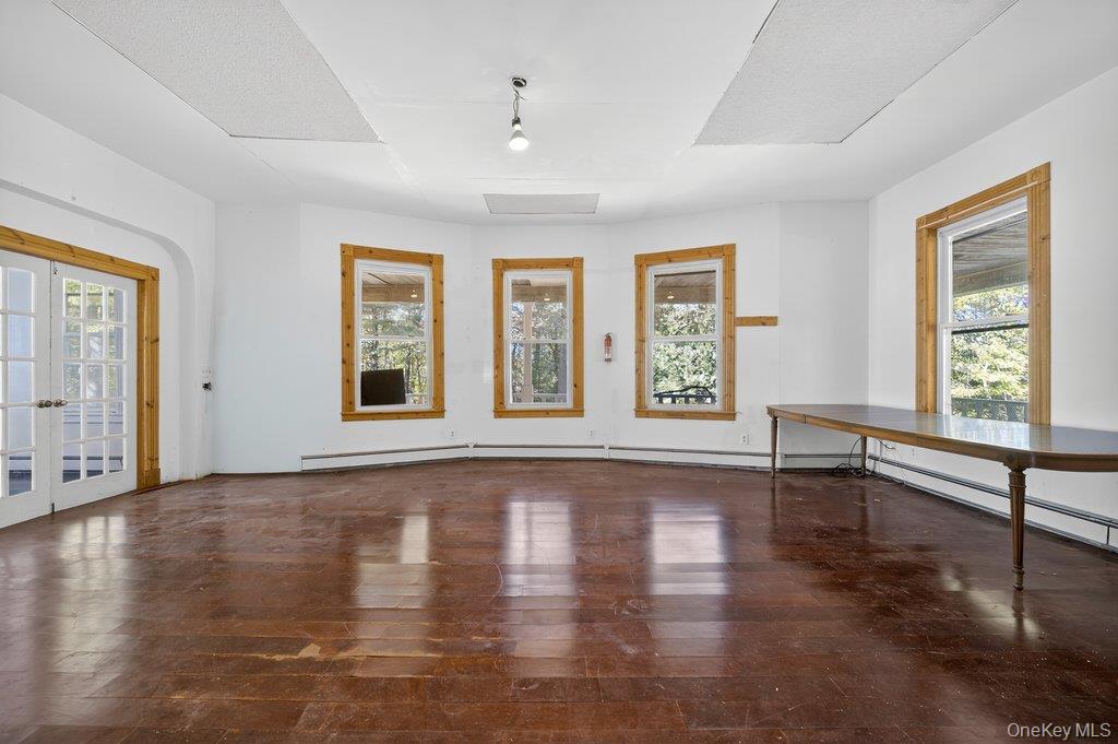 37 Little Road Wurtsboro, NY 12790 - Photo 3 of 24 a view of an empty room with window and wooden floor
