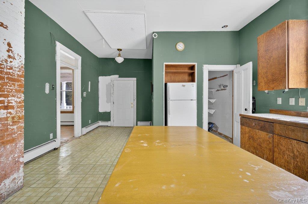 37 Little Road Wurtsboro, NY 12790 - Photo 9 of 24 a spacious bathroom with a granite countertop sink and a large mirror