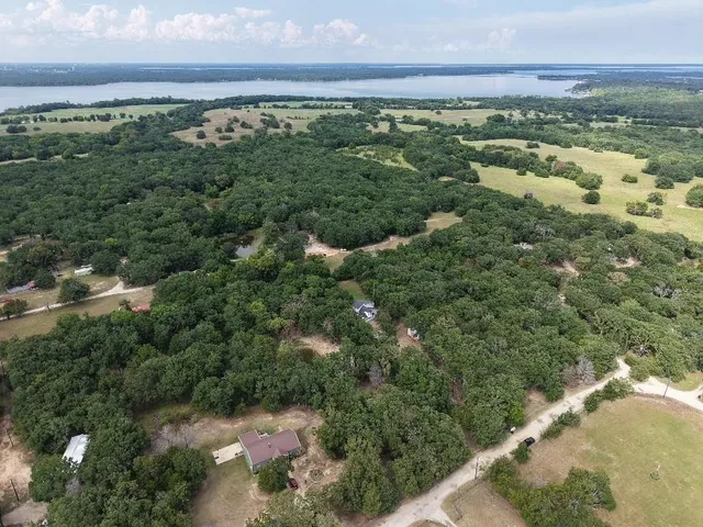 a view of a lake with a city