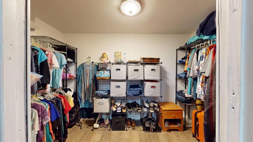 15415 Thunder Road Terrell, TX 75161 - Photo 12 of 21 Large Walk in closet with wood-style floors
