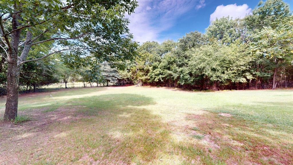 15415 Thunder Road Terrell, TX 75161 - Photo 16 of 21 a view of yard with green space