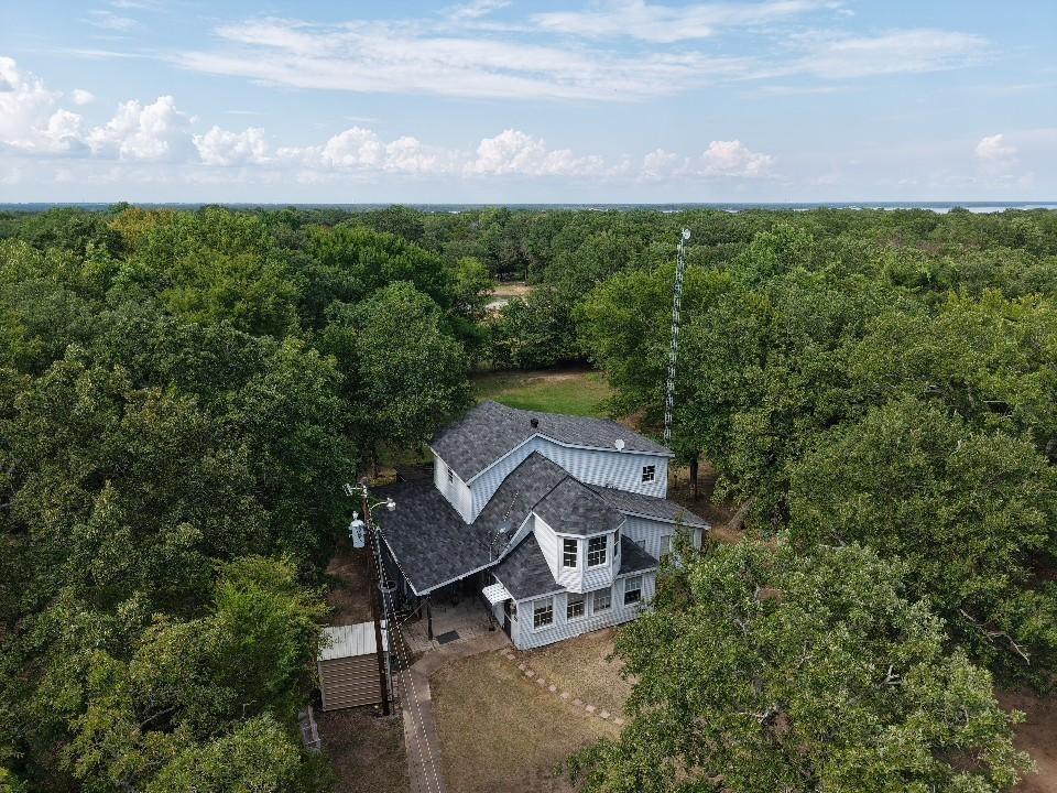 15415 Thunder Road Terrell, TX 75161 - Photo 2 of 21 an aerial view of a house with a yard