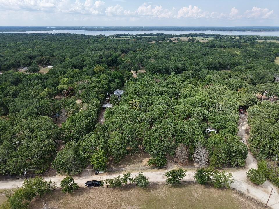 15415 Thunder Road Terrell, TX 75161 - Photo 21 of 21 an aerial view of a forest with houses