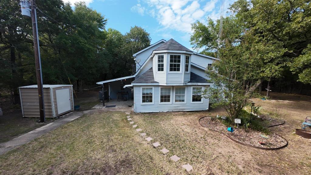 15415 Thunder Road Terrell, TX 75161 - Photo 3 of 21 Close Up View of Home and Storage