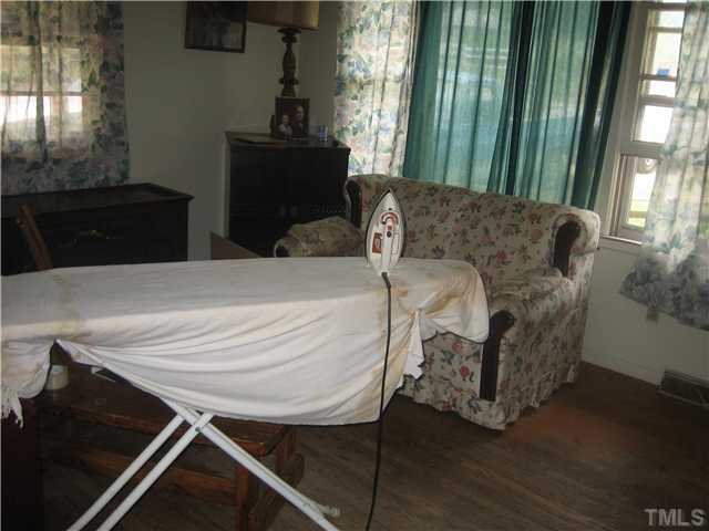 4222 Fuller Road Efland, NC 27243 - Photo 3 of 3 Hard wood flooring in Living room and 3 bedrooms.