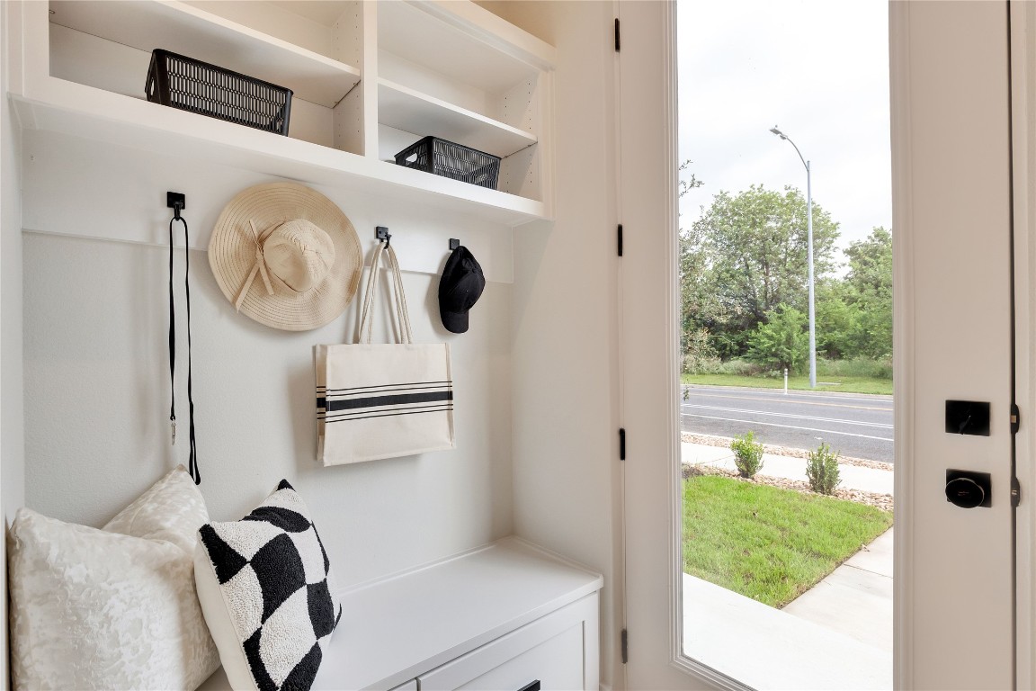 1937 East 38th 1/2 Street, Unit A Austin, TX 78723 - Photo 24 of 26 a picture of a room with wooden floor and windows