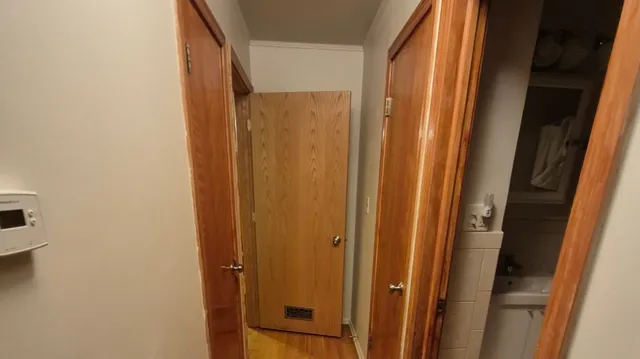 a bathroom with a shower and a door