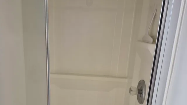 a close view of cabinet with washer and dryer