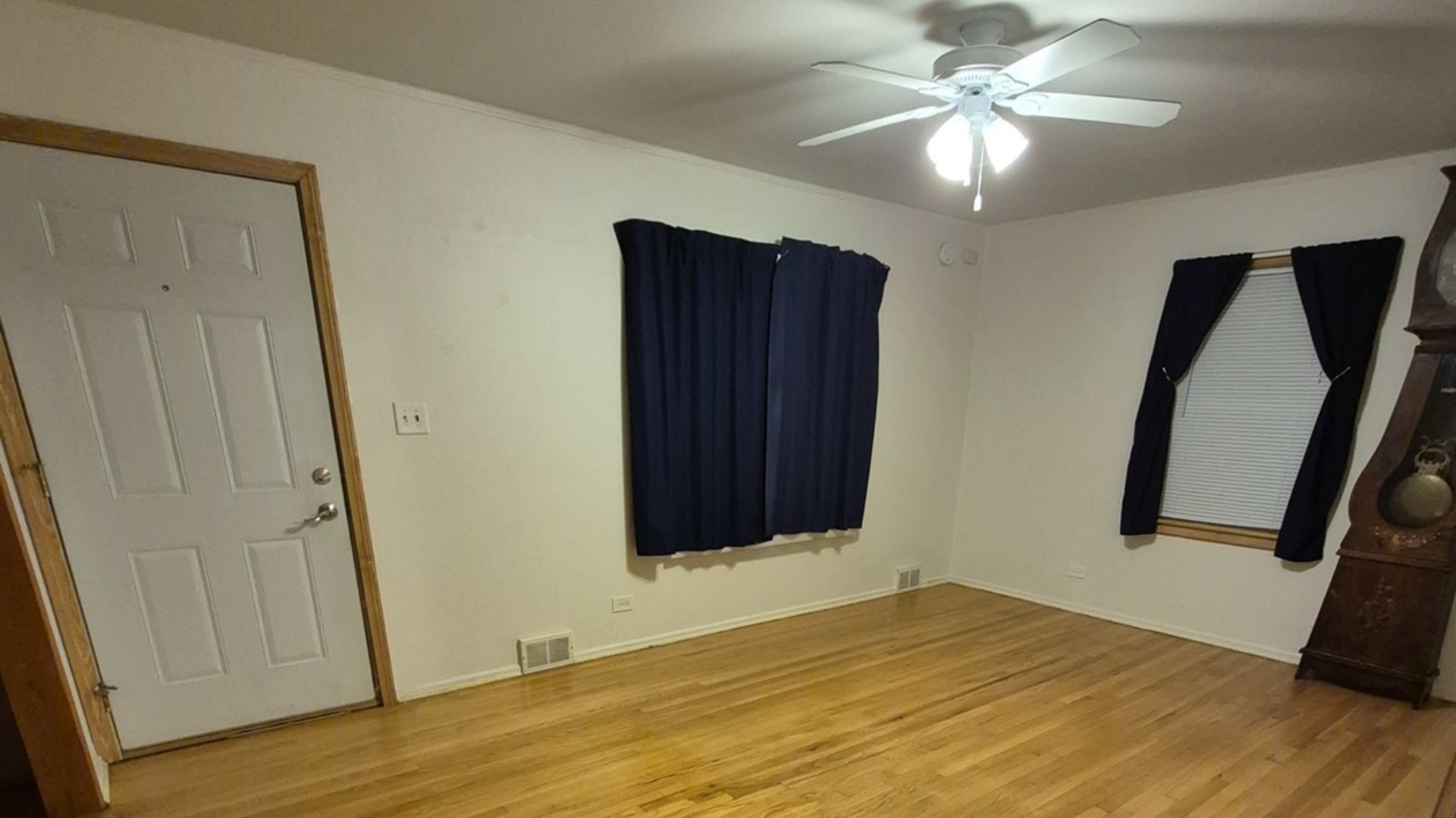 1224 North Irving Avenue Berkeley, IL 60163 - Photo 23 of 25 a view of an empty room with wooden floor and a window