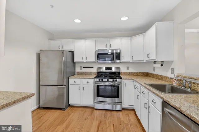 a view of a balcony with wooden floor