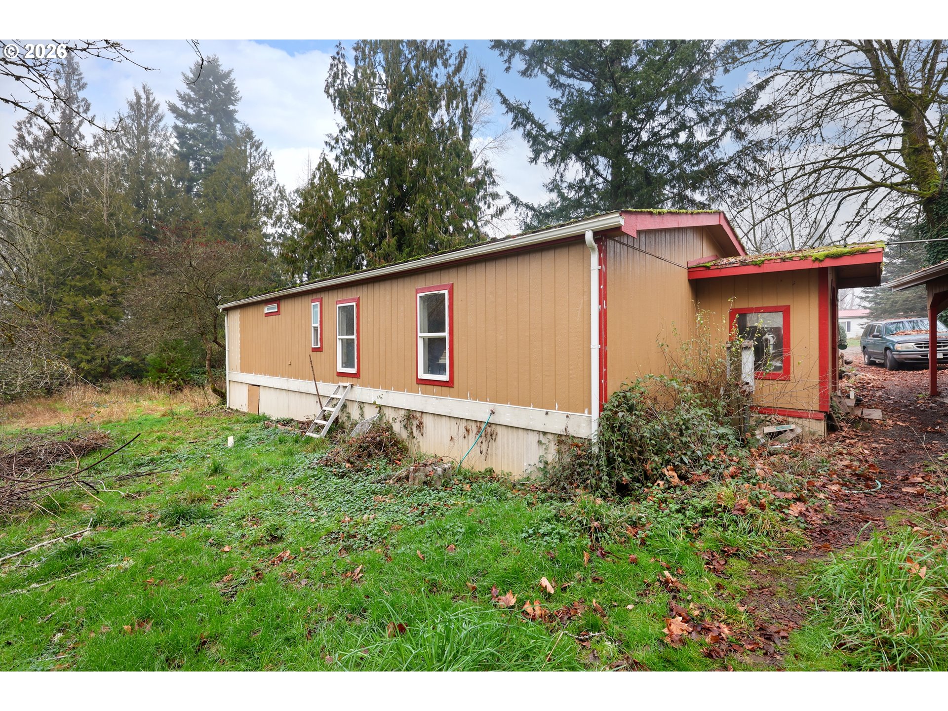 114 Shannon Lane Chehalis, WA 98532 - Photo 25 of 27 a house with trees in the background