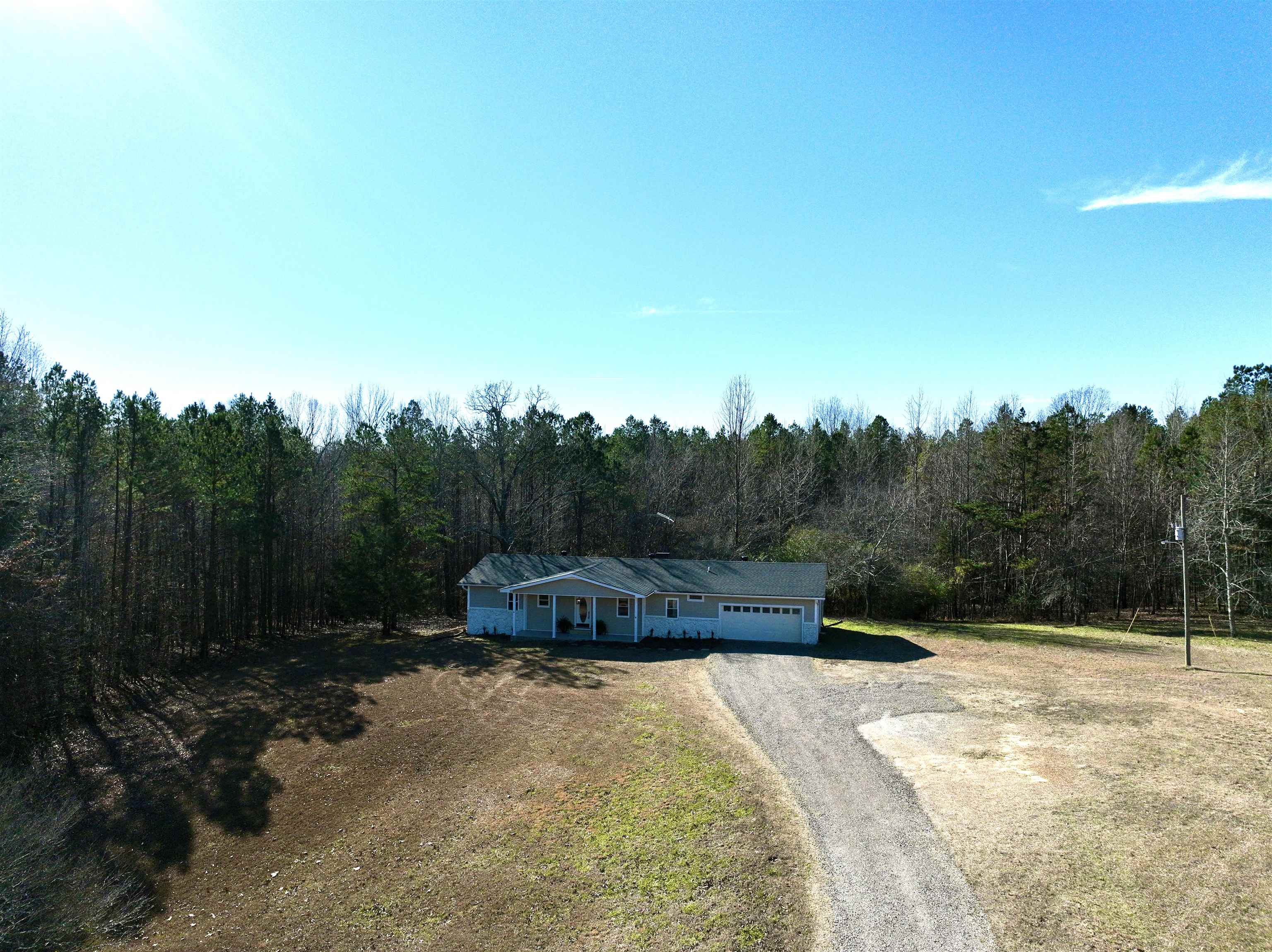 2224 Feddie Davis Road Ramer, TN 38367 - Photo 2 of 24 a view of a garden with trees