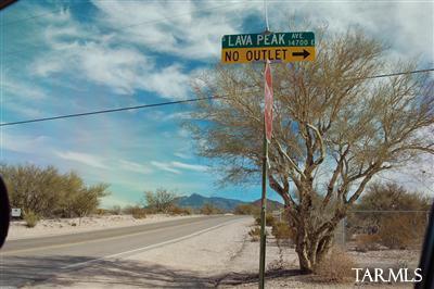 14674 East Colossal Cave Road Vail, AZ 85641 - Photo 7 of 11 Here's how you get to the property: Turn off of Colossal Cave Road at this sign and proceed south on Lava Peak. Then, look for the tan barn - see next photo
