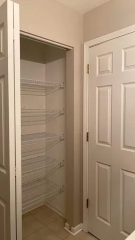 a bathroom with a glass door shower