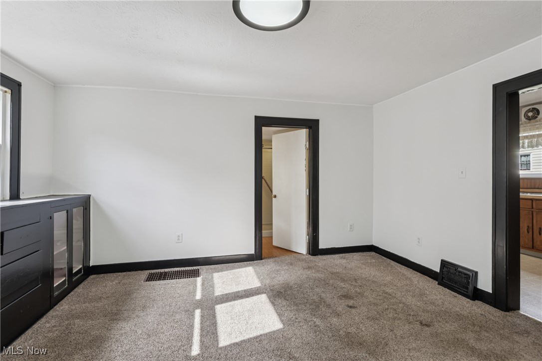 1674 Betz Road Akron, OH 44306 - Photo 13 of 29 Dining room with built-in and carpet flooring