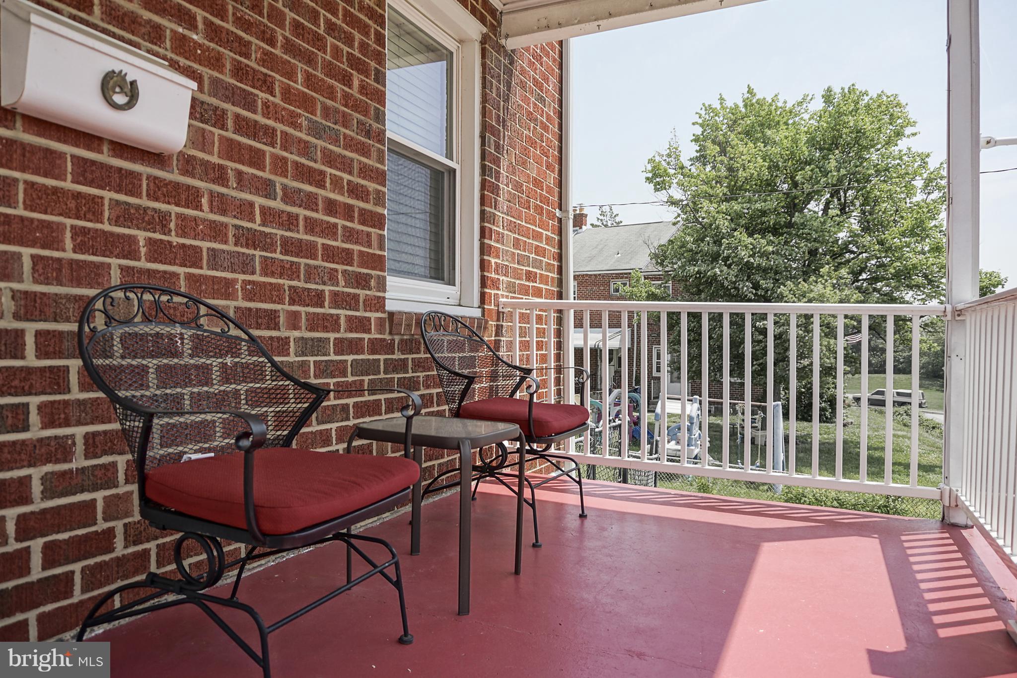 1082 Downton Road Baltimore, MD 21227 - Photo 3 of 26 Relax on the front porch.