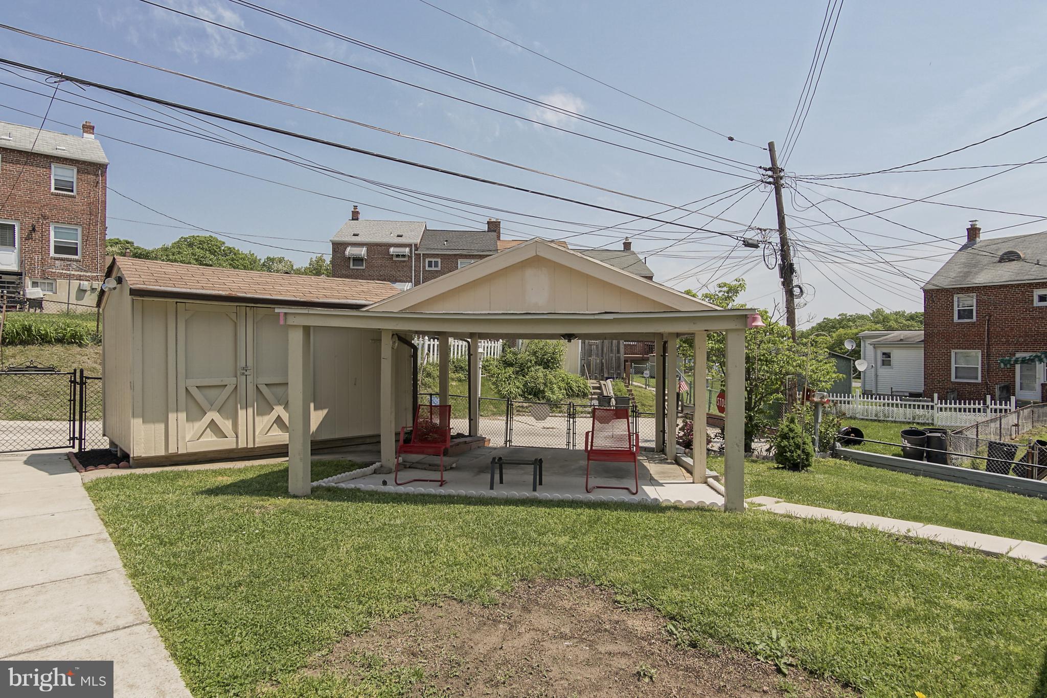 1082 Downton Road Baltimore, MD 21227 - Photo 25 of 26 It's great to have a covered carport!