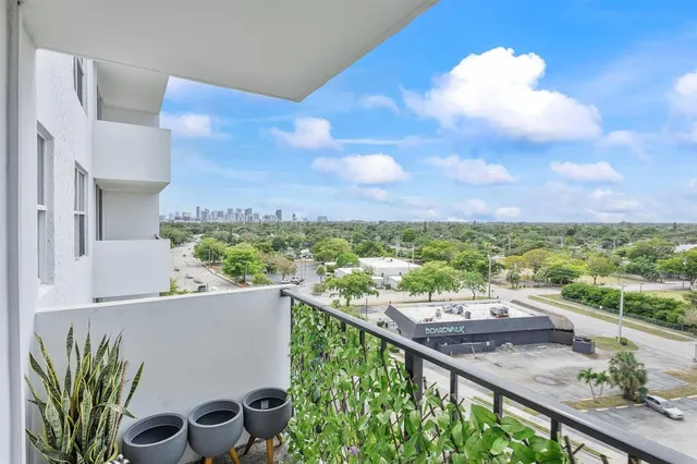 a view of a balcony with city view