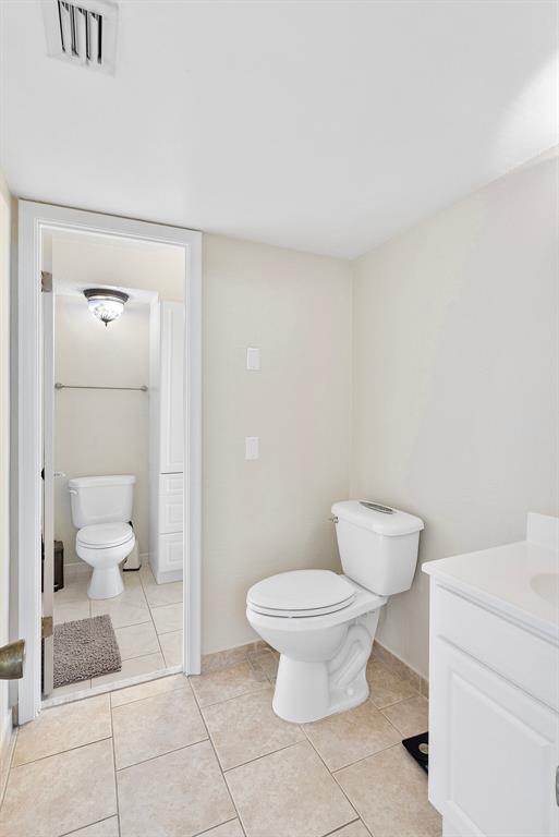 1800 North Andrews Avenue, Unit 9I Fort Lauderdale, FL 33311 - Photo 13 of 36 a bathroom with a toilet and a shower