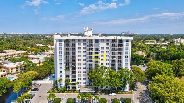 a view of a building with a garden