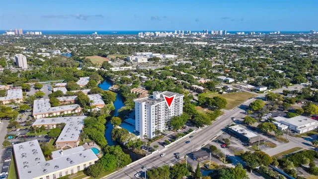 an aerial view of city and lake