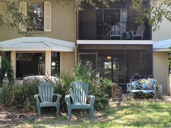 a view of house with patio outdoor seating area and entertaining space