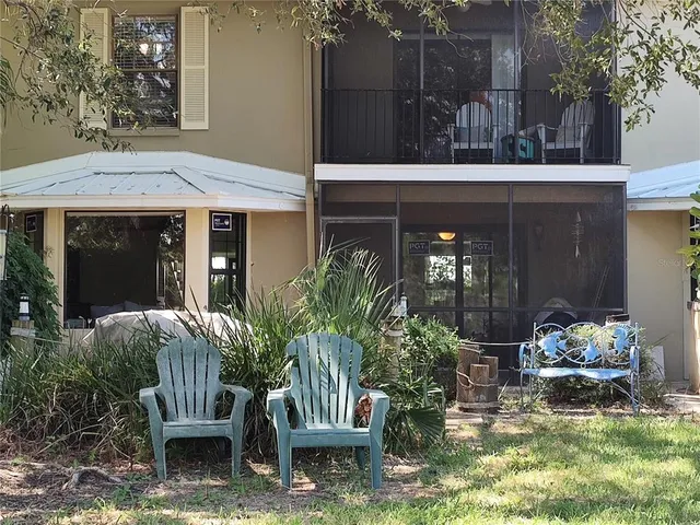 a view of house with patio outdoor seating area and entertaining space