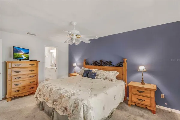 a utility room with cabinets and a couch