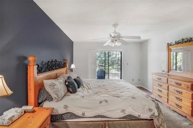 a white toilet sitting next to a bath tub