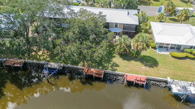 a view of house with swimming pool