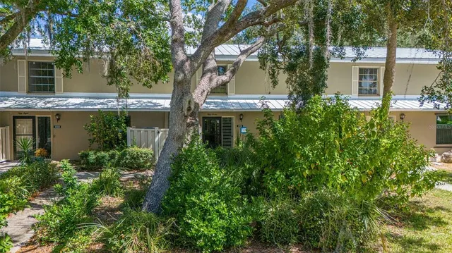 a front view of a house with a garage