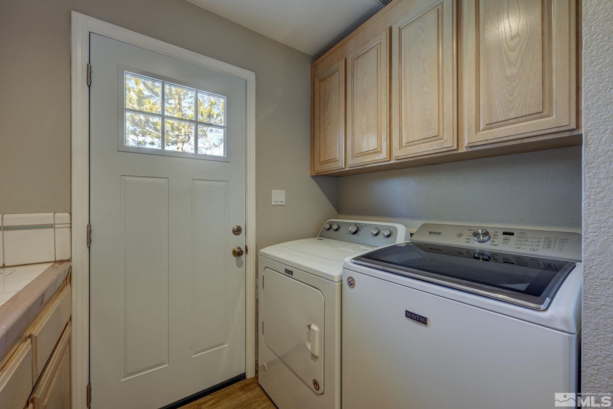 580 Creighton Way Reno, NV 89503 - Photo 19 of 40 a utility room with dryer and washer