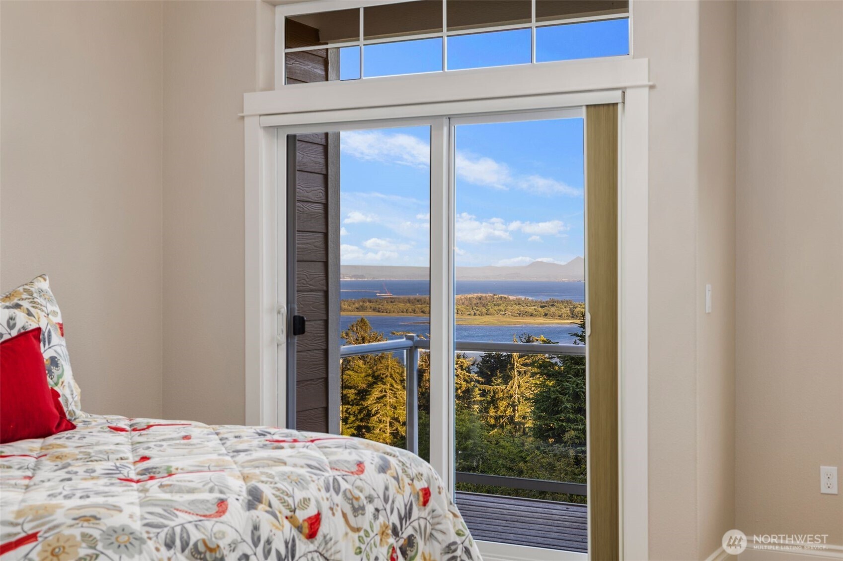 3224 Overlook Loop Ilwaco, WA 98624 - Photo 25 of 38 a bedroom with a bed and a window