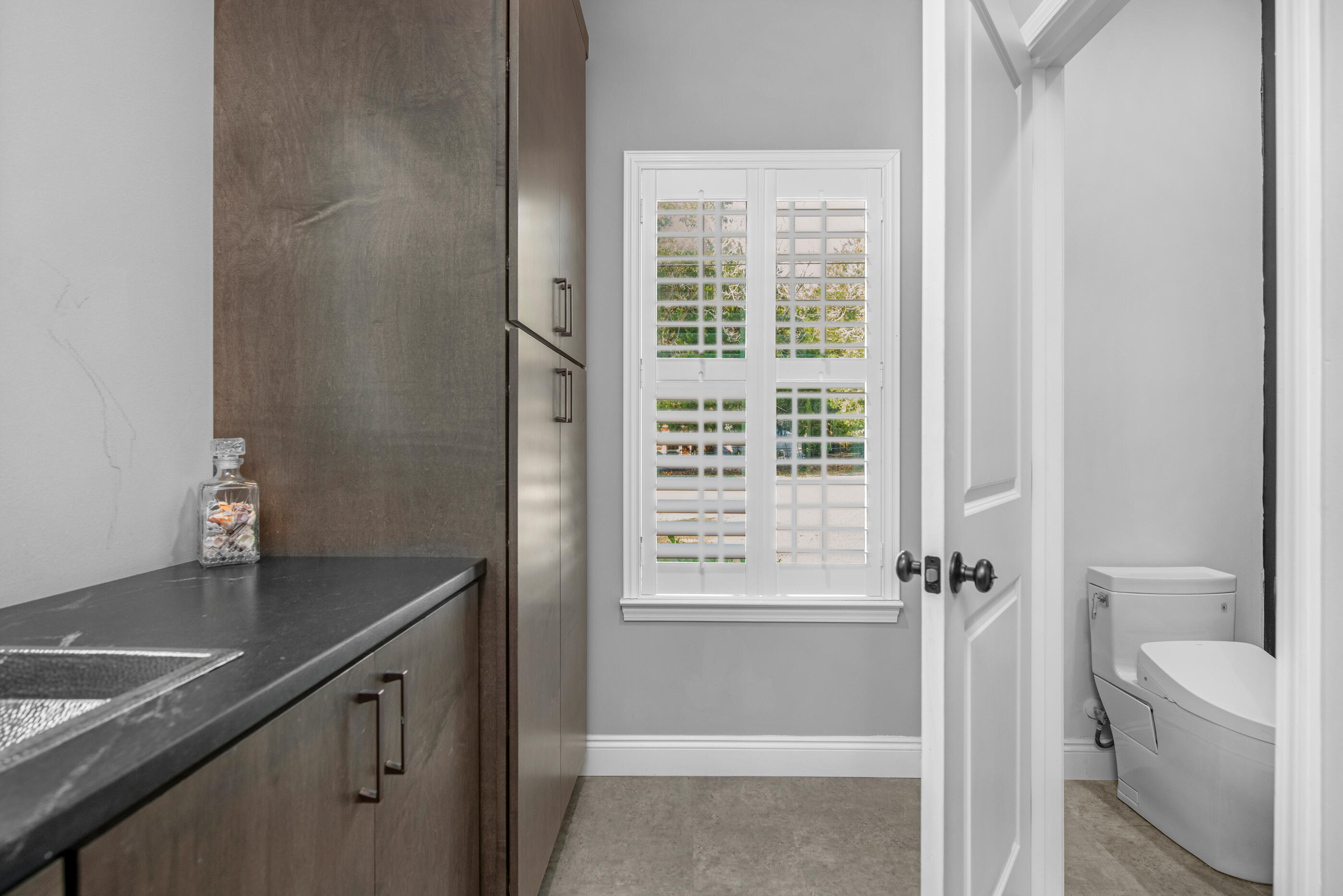 342 Eastern Street Freeport, FL 32439 - Photo 30 of 77 a view of a bathroom with a sink and a toilet