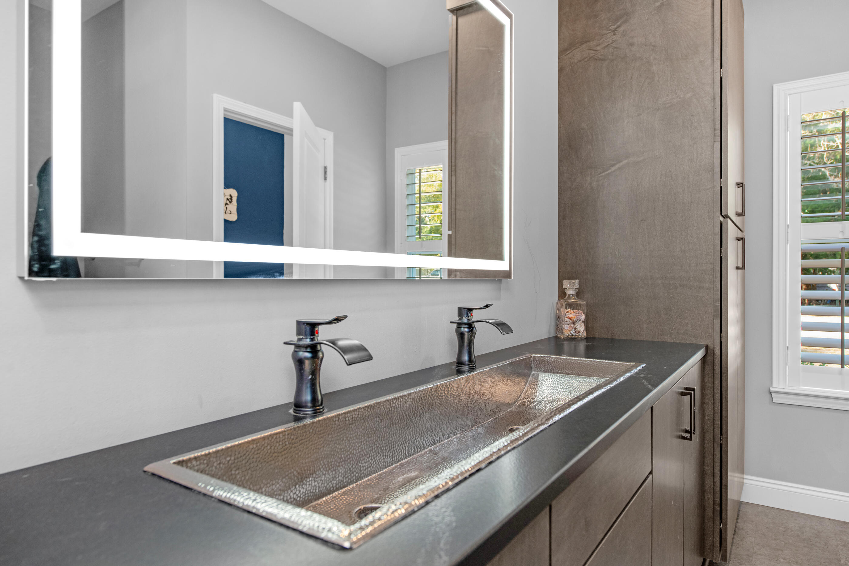 342 Eastern Street Freeport, FL 32439 - Photo 31 of 77 a kitchen with a sink and a window