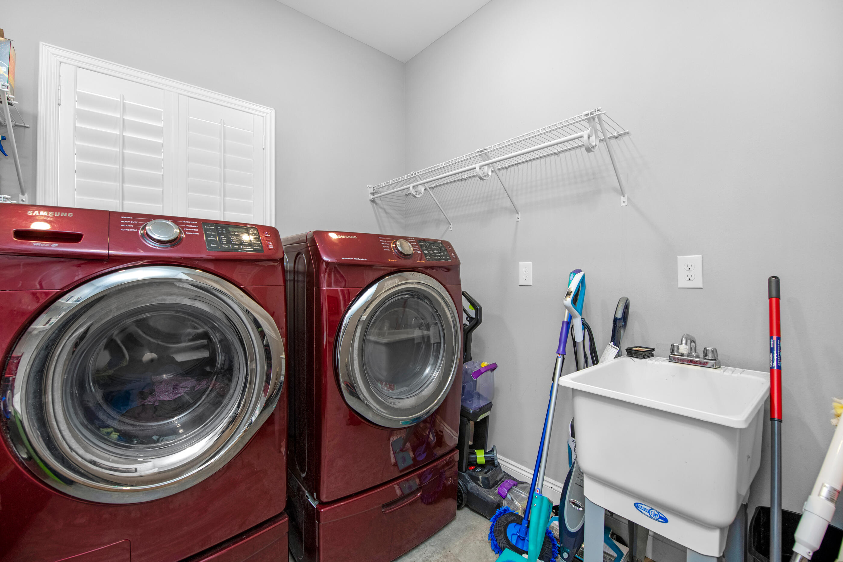 342 Eastern Street Freeport, FL 32439 - Photo 40 of 77 a utility room with dryer and washer