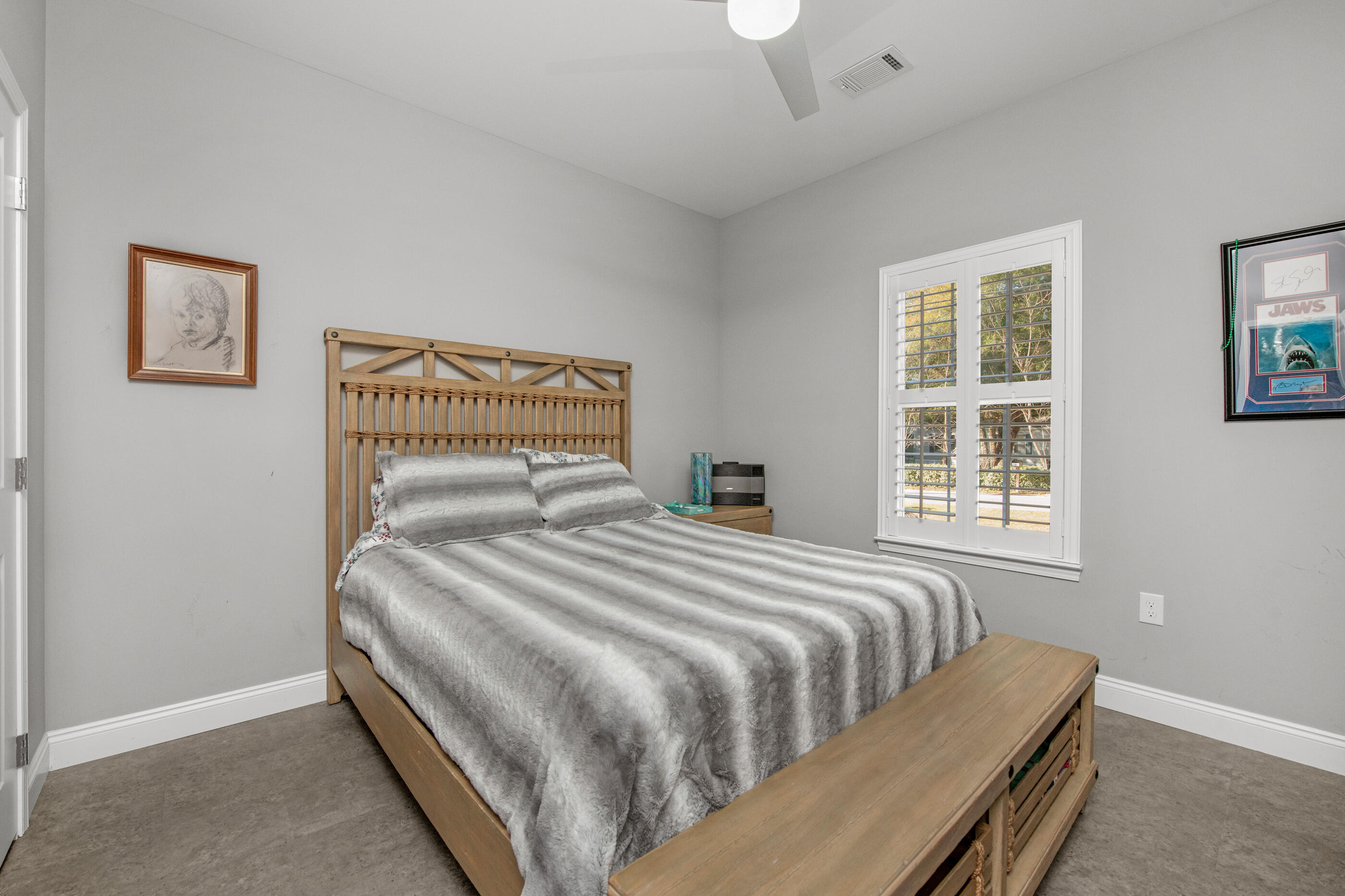 342 Eastern Street Freeport, FL 32439 - Photo 48 of 77 a bedroom with a bed and a window