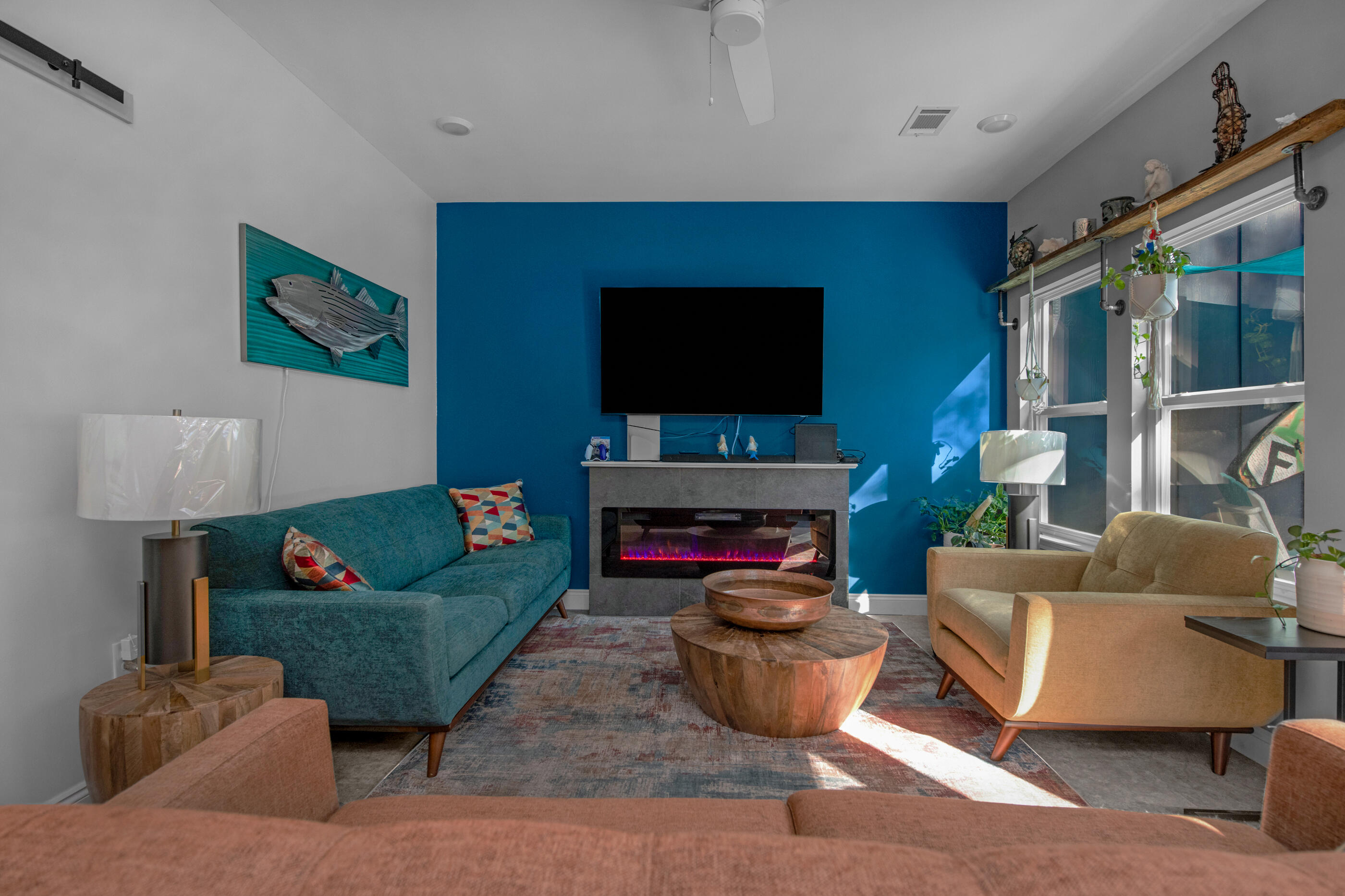 342 Eastern Street Freeport, FL 32439 - Photo 54 of 77 a living room with furniture and a flat screen tv