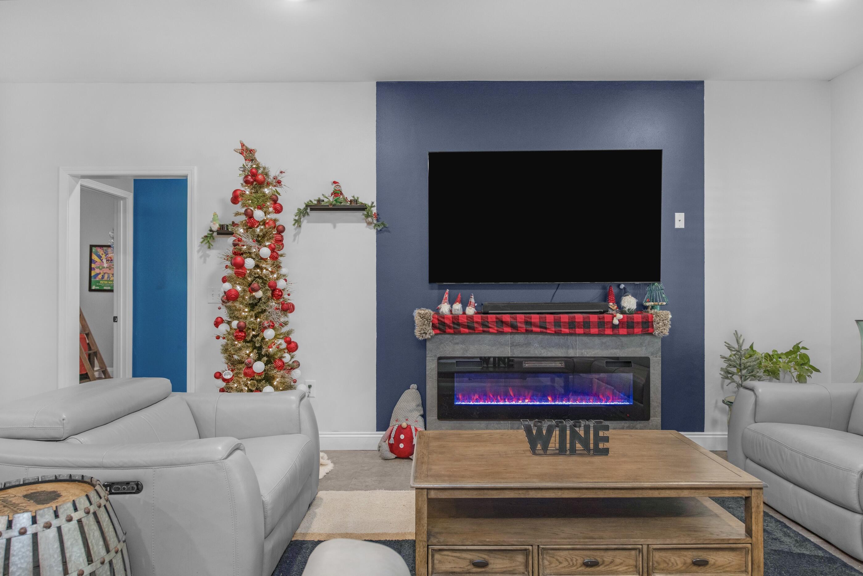 342 Eastern Street Freeport, FL 32439 - Photo 6 of 77 a living room with furniture and a flat screen tv