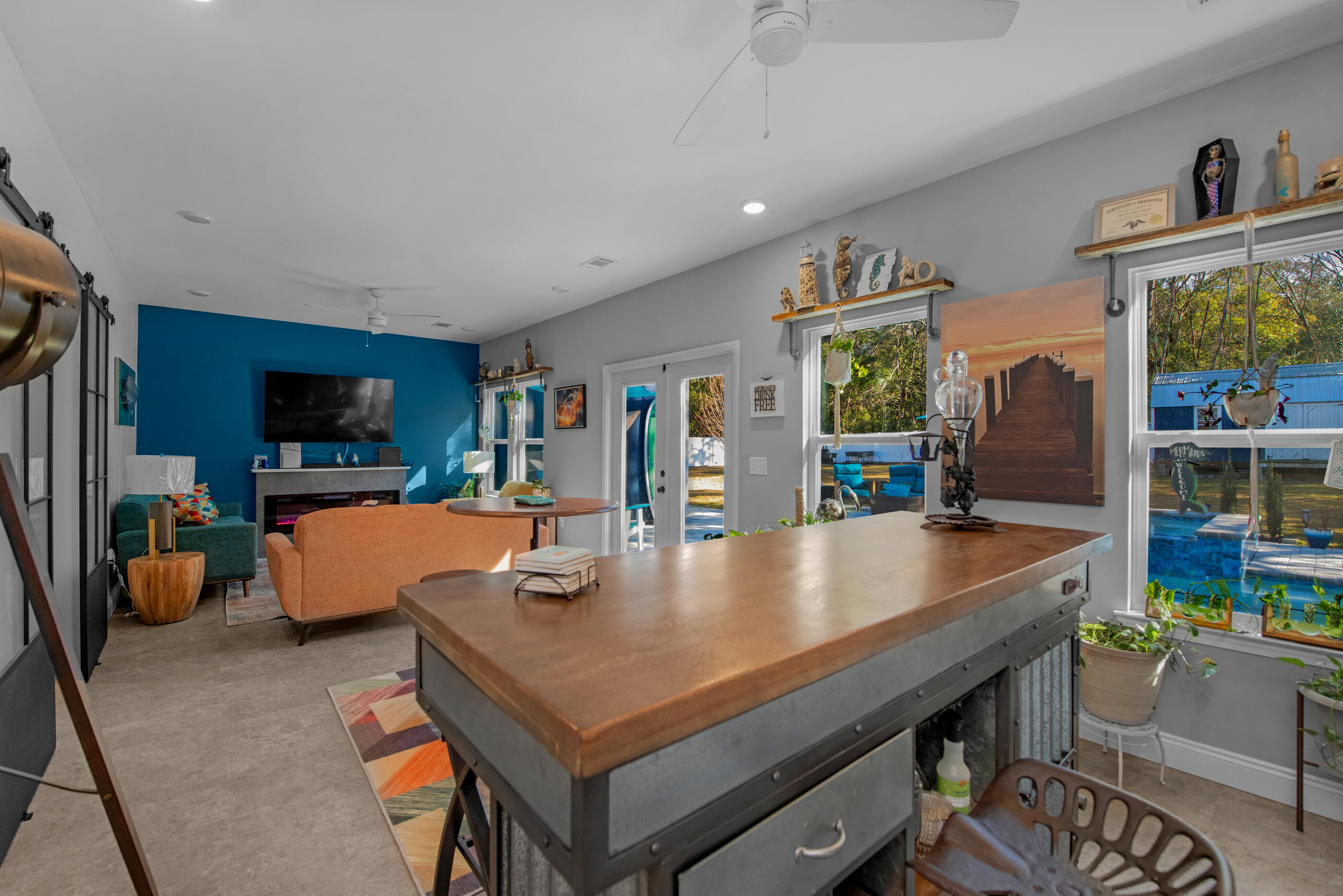 342 Eastern Street Freeport, FL 32439 - Photo 62 of 77 a living room with furniture and a flat screen tv