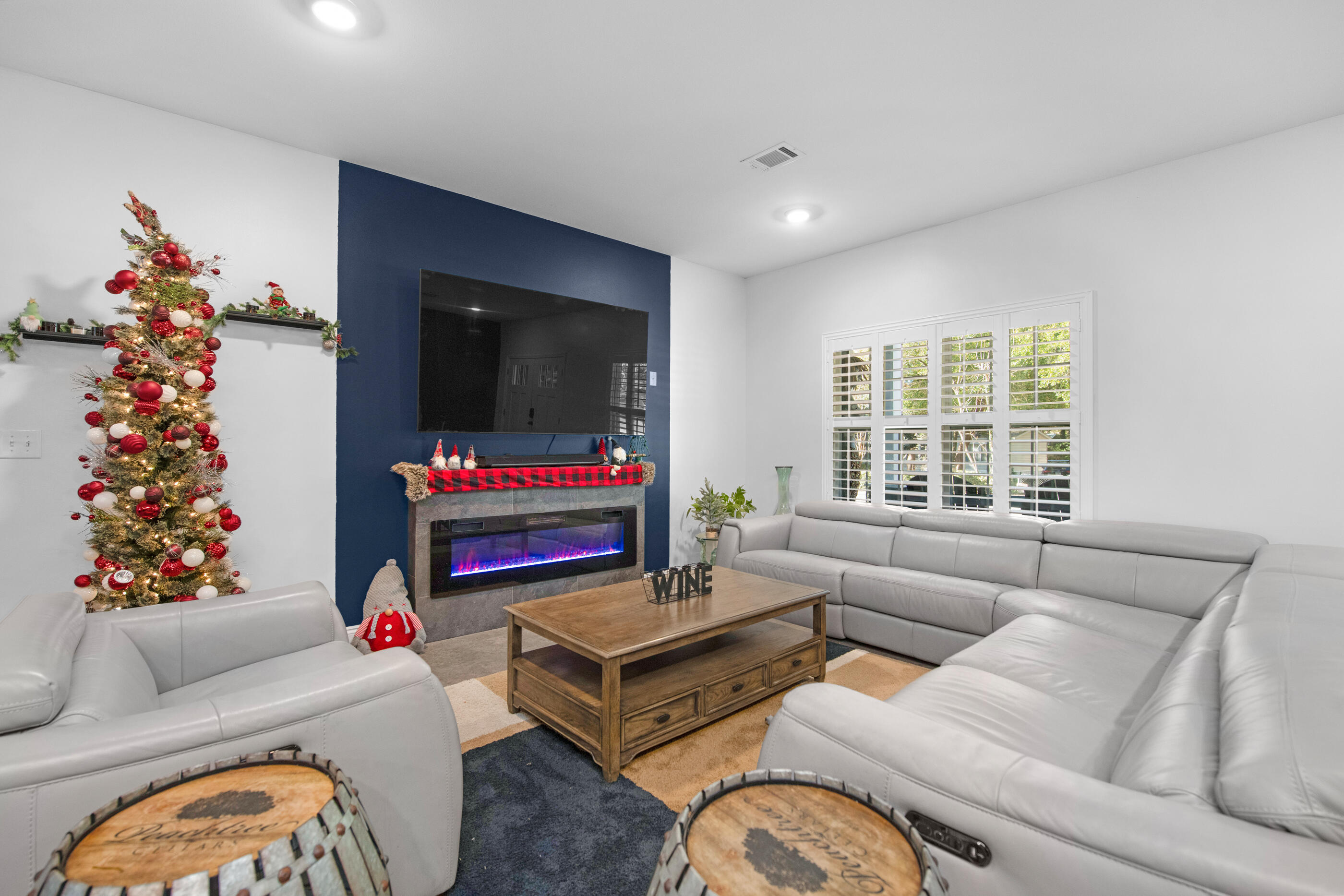 342 Eastern Street Freeport, FL 32439 - Photo 7 of 77 a living room with furniture and a flat screen tv